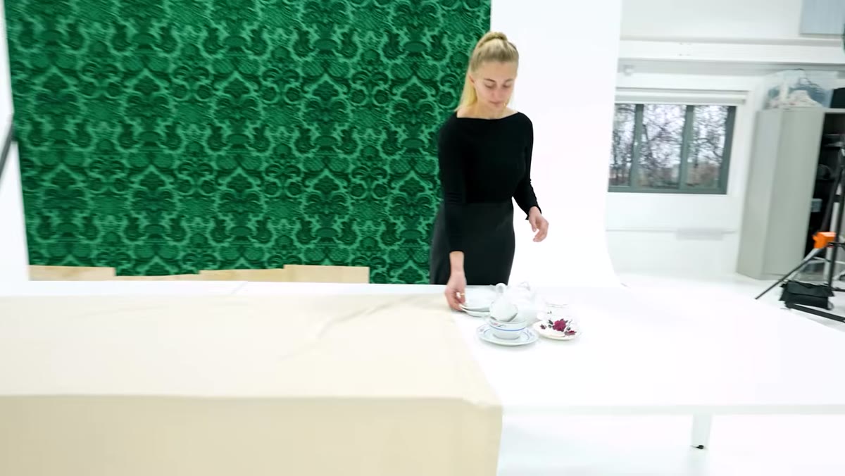 Team testing smashing crockery for height and spray dynamics